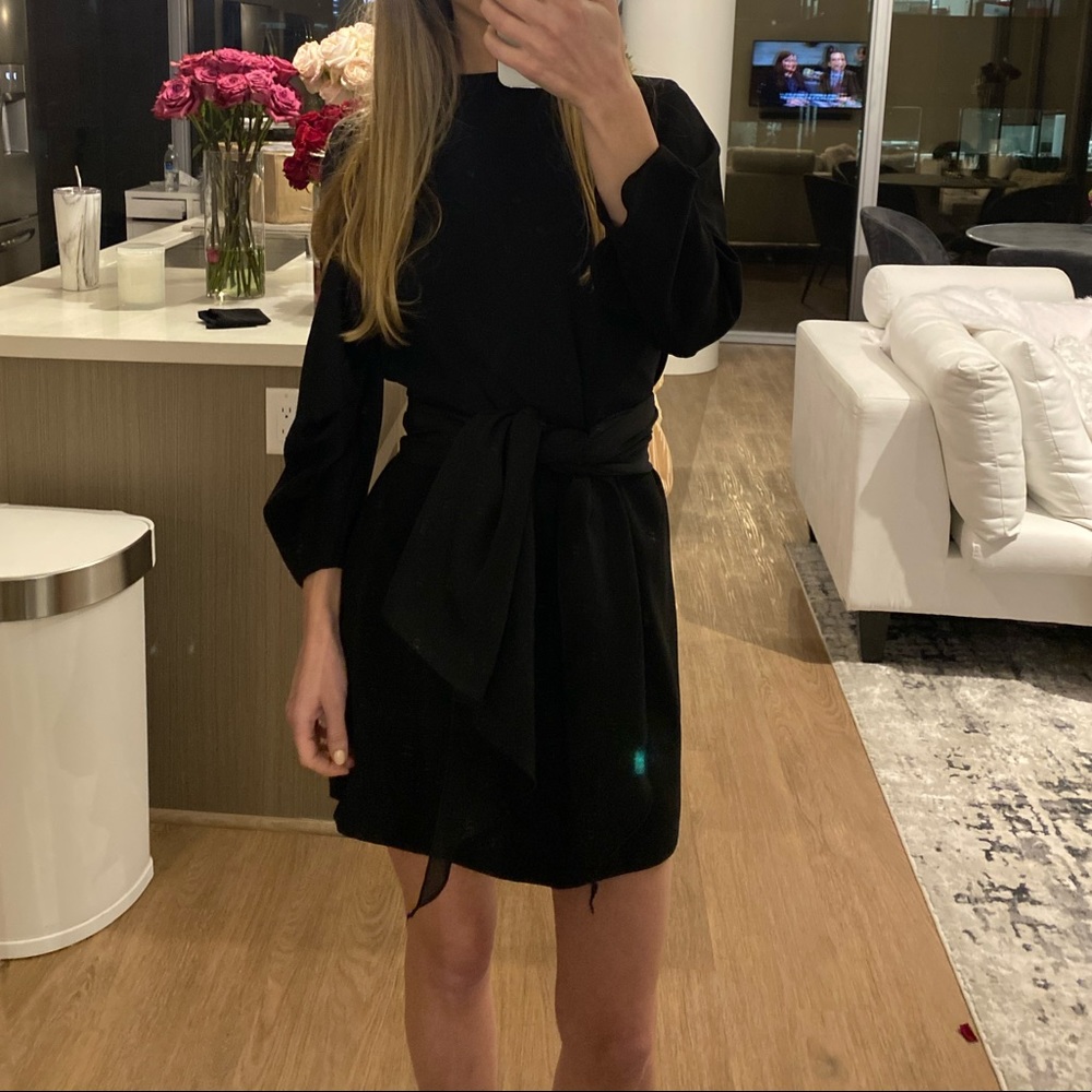 Mock neck black long sleeve dress with ruffled bib